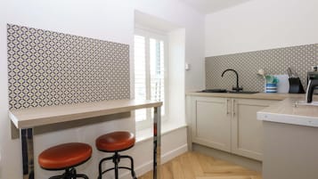 Fridge, microwave, toaster, cookware/dishes/utensils