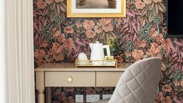 Senior Double Room | Minibar, in-room safe, individually decorated, individually furnished