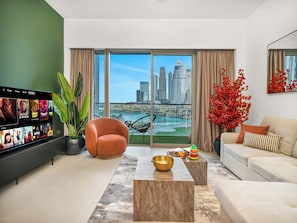 Luxury Apartment, 2 Bedrooms, Balcony, Lake View | Living room | 65-inch Smart TV with digital channels, Netflix, Hulu