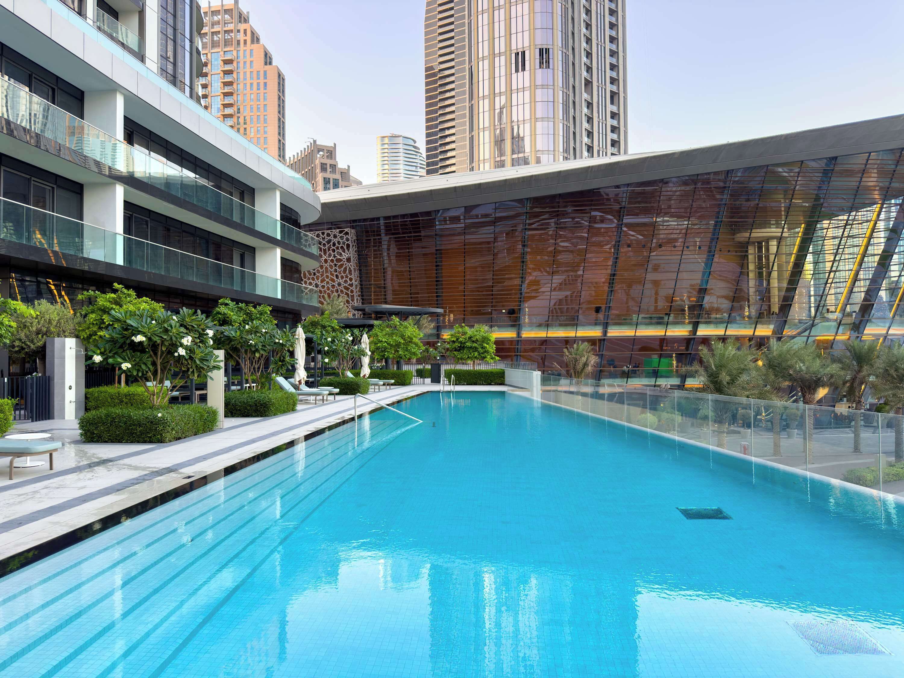 2 outdoor pools, open 6:00 AM to 10:00 PM, pool umbrellas, sun loungers