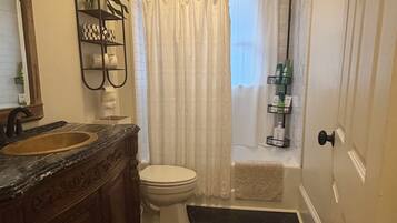 Hair dryer, towels, soap, toilet paper