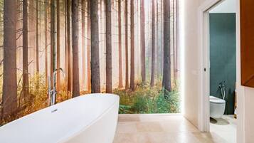 Shower, towels, shampoo, toilet paper