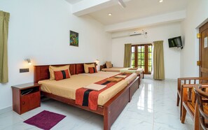 Family Quadruple Room | Desk, laptop workspace, blackout drapes, iron/ironing board - Mailagama Cinnamon Residence (Sella Katharagama)