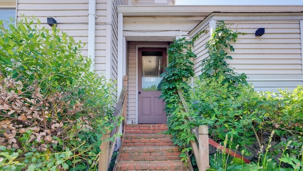 A set of brick stairs leading to a door with a small porch area. - Gastropub On-site: Loudoun Wine Country Apartment (Hamilton)