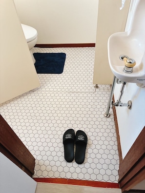 Hair dryer, towels, soap, toilet paper