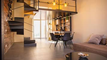 Basic Apartment | Living area | 32-inch flat-screen TV with cable channels, TV