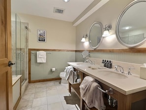 Shower, hair dryer, towels, shampoo