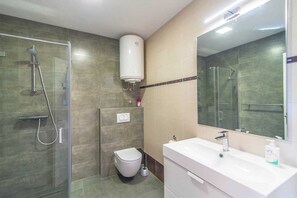 Hair dryer, towels, soap, toilet paper