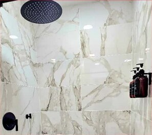 Shower, hair dryer, towels, toilet paper