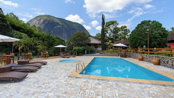 Outdoor pool, pool umbrellas, sun loungers