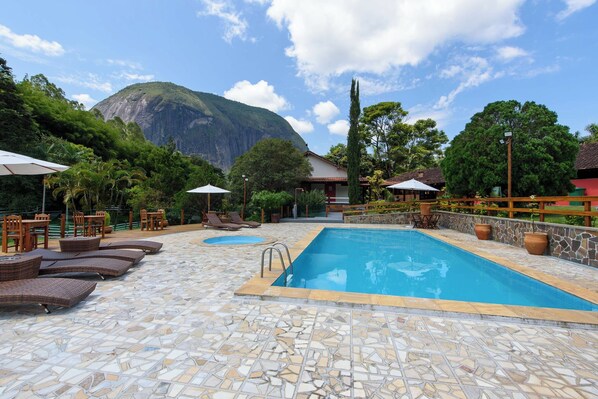 Outdoor pool, pool umbrellas, pool loungers