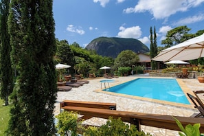 Outdoor pool, pool umbrellas, pool loungers