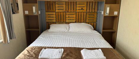 Blackout curtains, iron/ironing board, free WiFi