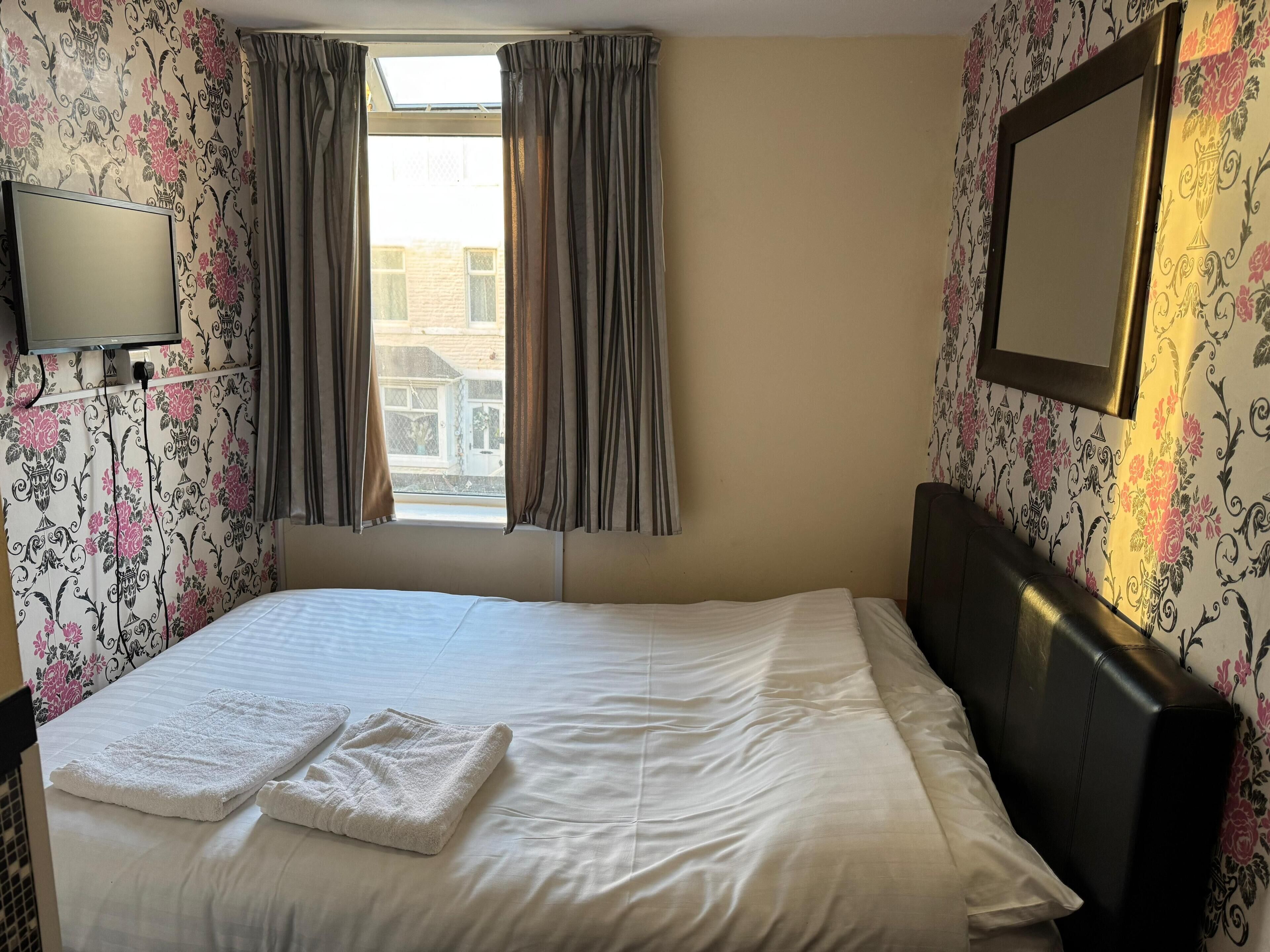 Room 210 | Blackout curtains, iron/ironing board, free WiFi