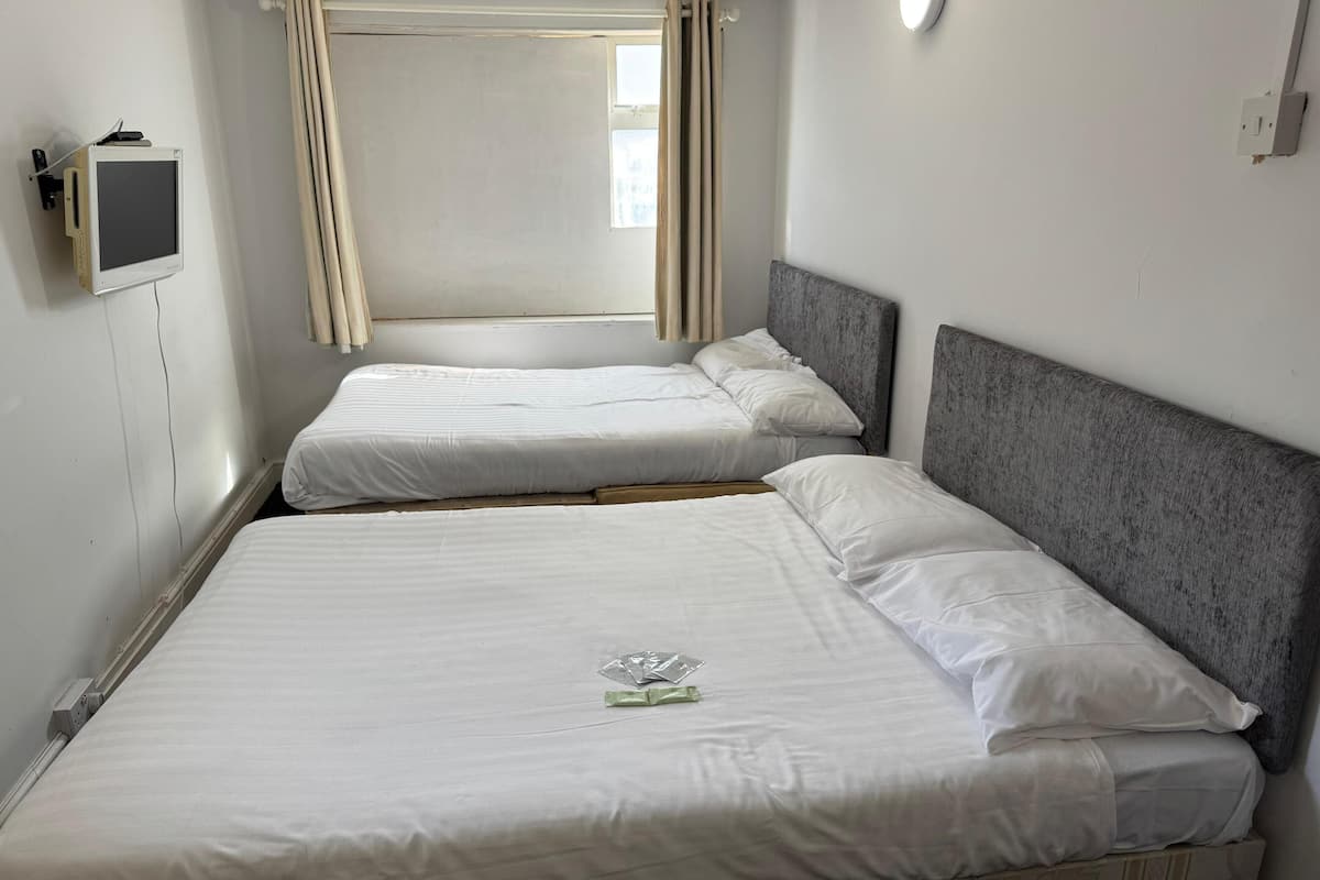 Room 304 | Cortinas blackout, ferros/tábuas de passar roupa, Wi-Fi de cortesia