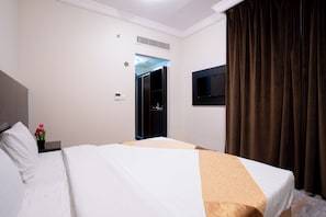 Habitación doble | Minibar, tabla de planchar con plancha, wifi gratis y ropa de cama