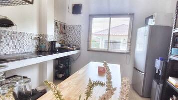 Fridge, microwave, stovetop, coffee/tea maker