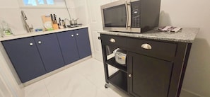 Fridge, microwave, stovetop, coffee/tea maker