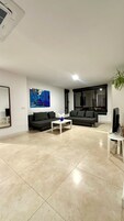 Apartment, 2 Bedrooms | Living area | Flat-screen TV