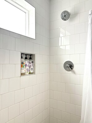 Shower, hair dryer, towels, soap