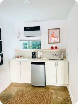 Fridge, microwave, stovetop, coffee/tea maker