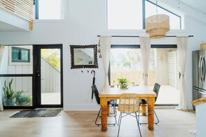 Dining - Walk to the Beach! Boho-Inspired 2BR Jupiter Loft w Private Outdoor Space (Jupiter)