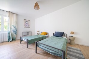 2 dormitorios, tabla de planchar con plancha, wifi gratis y ropa de cama