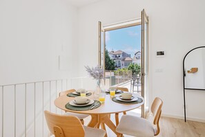 Family Apartment, Non Smoking | Dining room - The Sunny Duplex at BoaVista Flats (Porto)