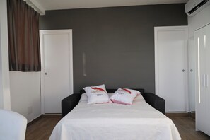 1 غرفة نوم وواي فاي مجانًا وملاءات أسرّة