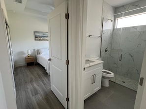 Bidet, towels, toilet paper