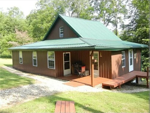 `Hideaway Cabin` that sits on 10 secluded acres.