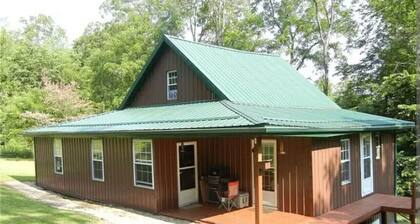 `Hideaway Cabin` that sits on 10 secluded acres.