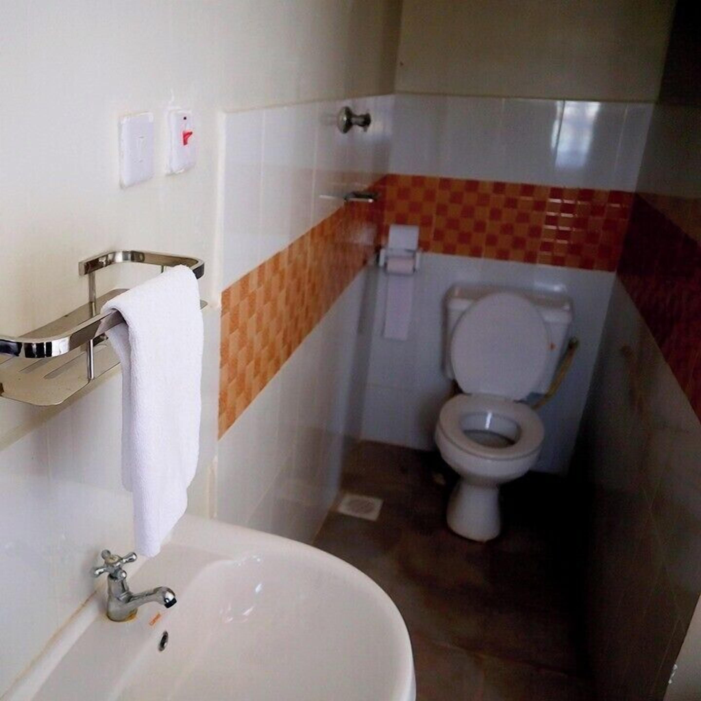 Shower, free toiletries, slippers, towels