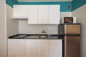 Fridge, microwave, toaster, cookware/dishes/utensils