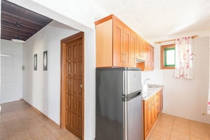 Fridge, microwave, toaster, cookware/dishes/utensils