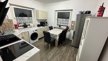 Fridge, toaster, cookware/dishes/utensils