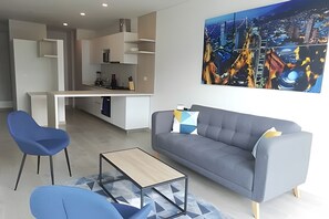 Premium Apartment | Living area | TV - Edificio Area 98 (Bogotá)
