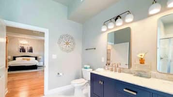 Shower, hair dryer, towels, shampoo
