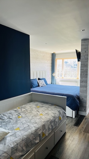 Chambre Triple Confort, patio, vue jardin