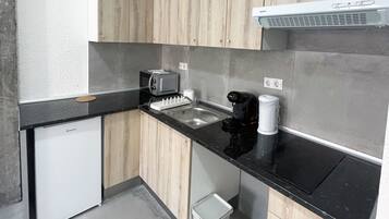 Fridge, microwave, stovetop, cookware/dishes/utensils