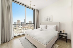 Desk, iron/ironing board, travel cot, WiFi - Modern 1BR in JVC with Pool Gym and Parking (Dubai)