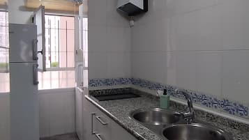 Een magnetron, een oven, een kookplaat