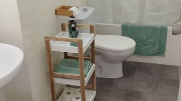 Hair dryer, towels, soap, toilet paper