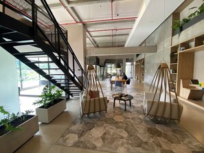 Economy Apartment, Balcony, City View | Living area | 45-inch flat-screen TV with cable channels