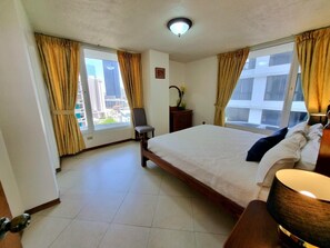 1 bedroom, desk, iron/ironing board, travel crib