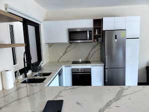 Microwave, oven, dishwasher, coffee/tea maker - Arrocito beach village condo Bahias de Huatulco, oax (El Arrocito)