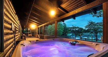 Cabin on 35 acres w/private lake for fishing, fenced yard, hot tub, pool table