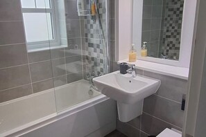 Shower, eco-friendly toiletries, hair dryer, towels