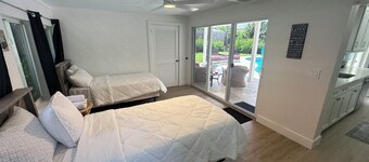 This modern 4-bedroom home sleeps 8 with 5 beds, 2 baths & a private pool.