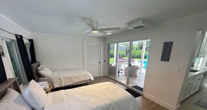 This modern 4-bedroom home sleeps 8 with 5 beds, 2 baths & a private pool.